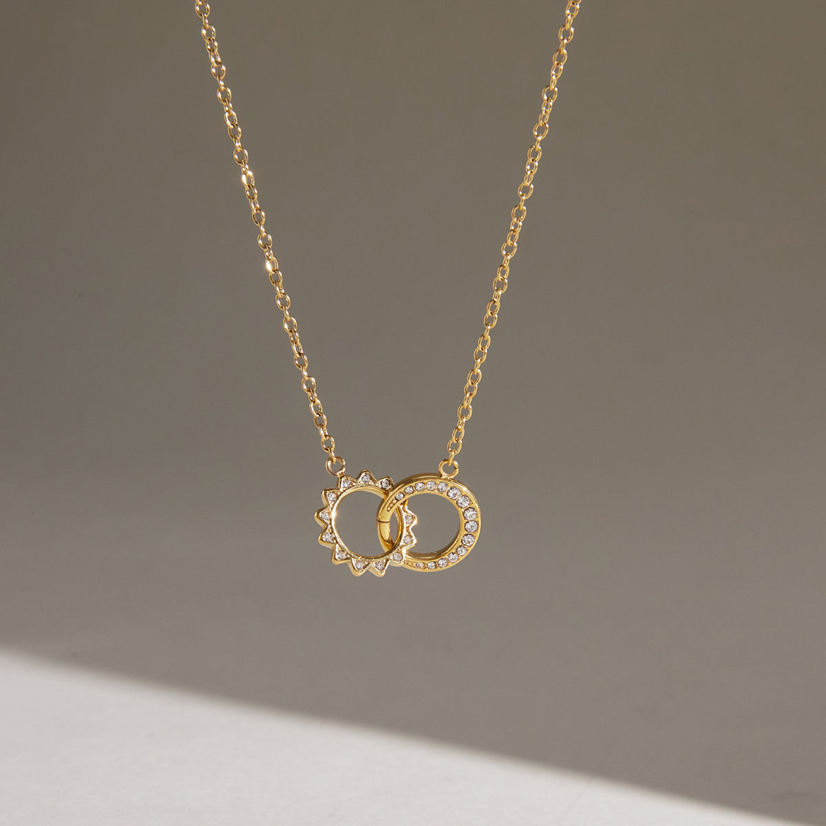 J&D Jewelry 18K Gold Plated Stainless Steel Interlocking Double Ring Sun Necklace Waterproof Rhinestone Pendant for Women