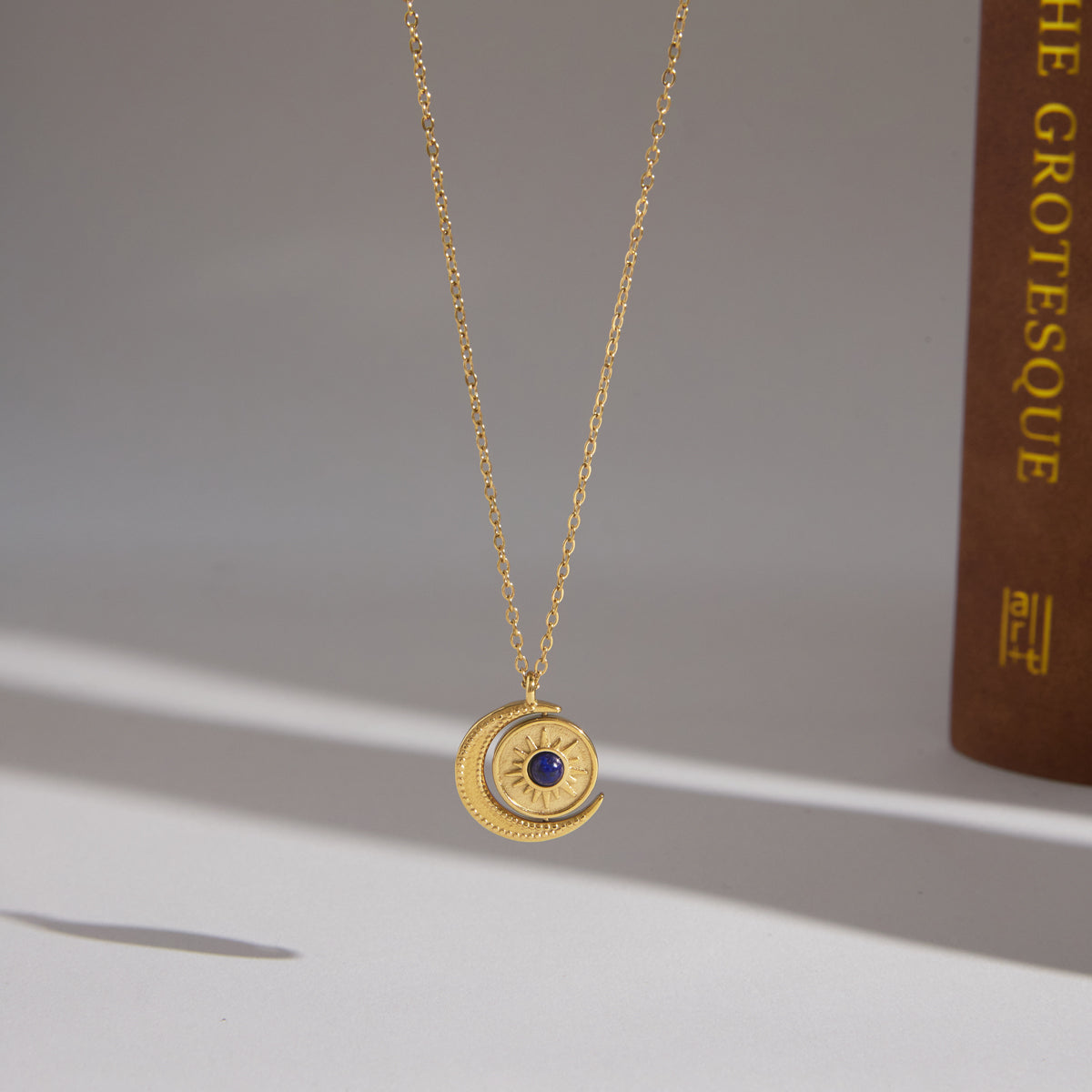 J&D  Rotating Sun Moon Pendant