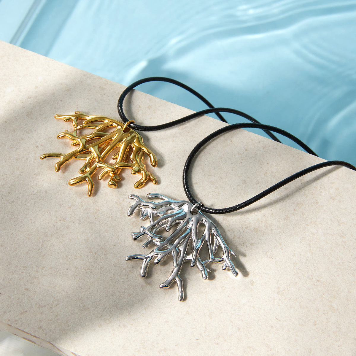 J&D   Coral Pendant Black Wax