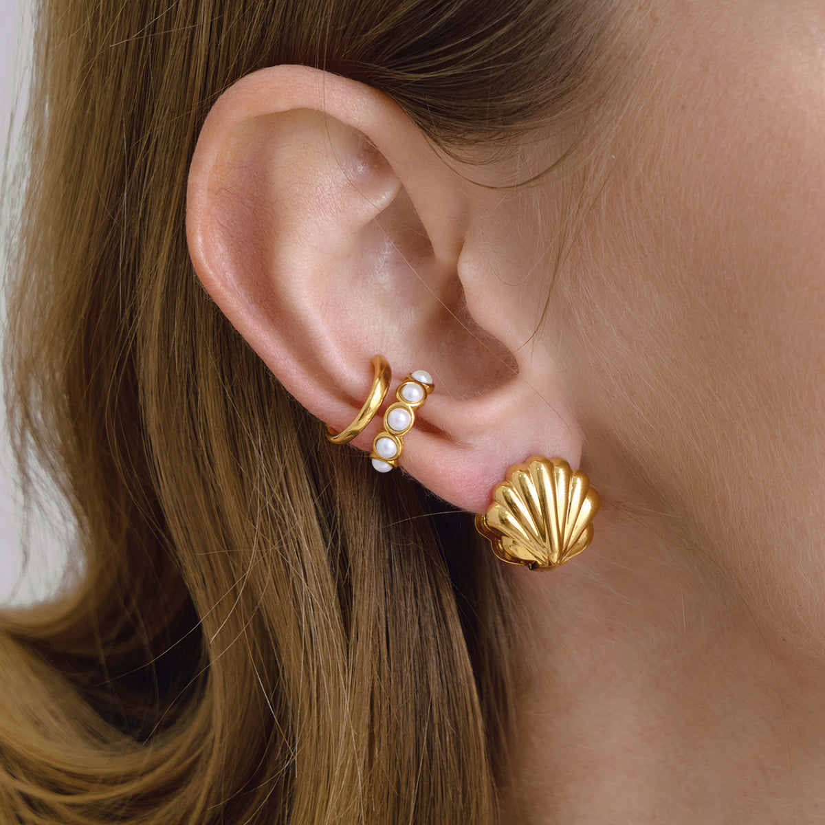 J&D  Classic Hollow Sea Shell Earrings