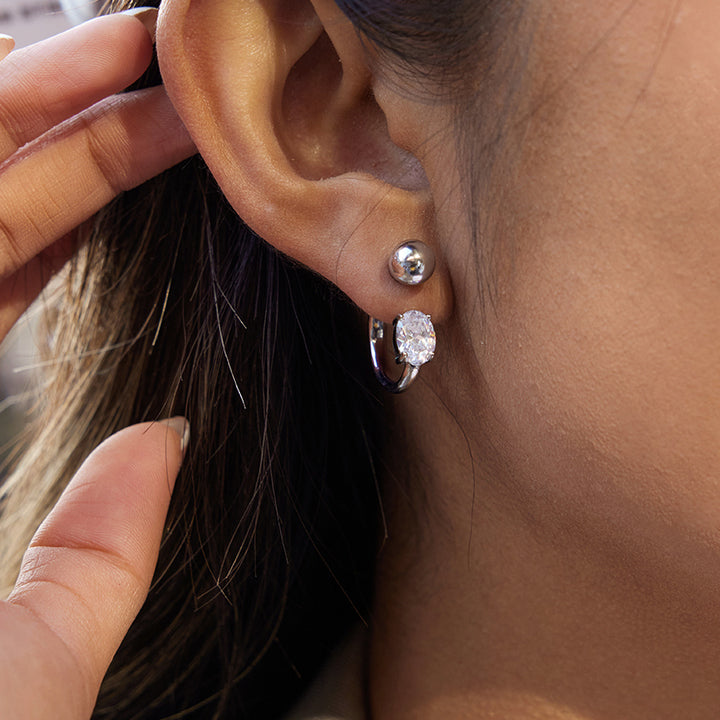 J&D Elegant Silver Tone Oval CZ Huggie Hoops Stainless Steel Modern Geometric C Hoop Earrings for Women Everyday Jewelry